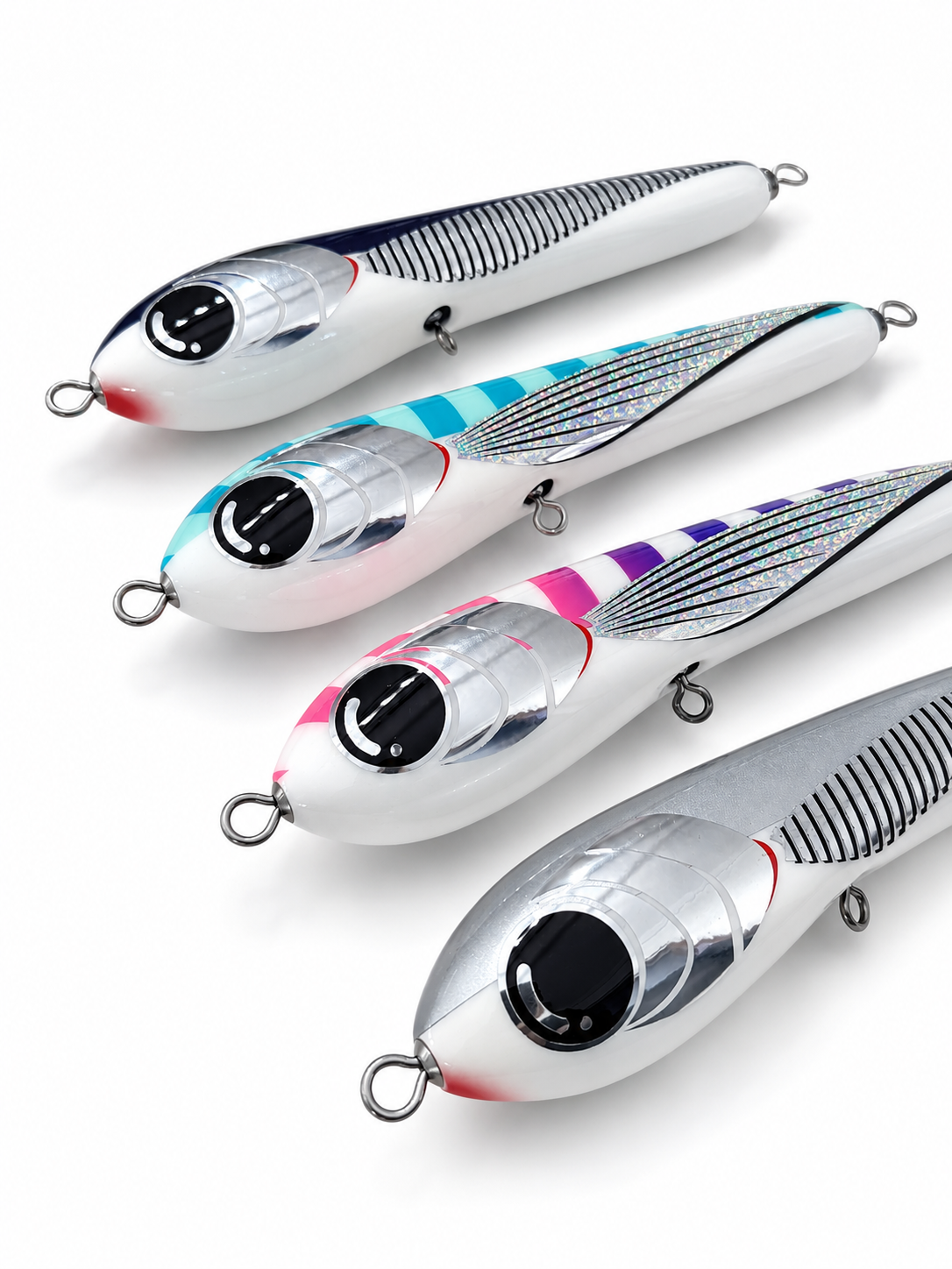 Volcanic Lures Offering 210 stickbaits shown from an alternate angle in Tropical Pilotfish, Green Flying Fish, Maziora and Silver Pearl colourways.